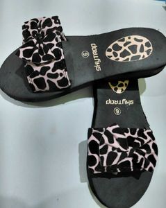 SkyTrap Animal Print flip flops.