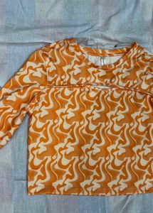 Orange Swirl Long Sleeve Crop Top