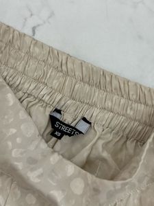 Cream Colour Animal print loose fitted trousers