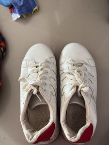White Sneakers with Unique Design