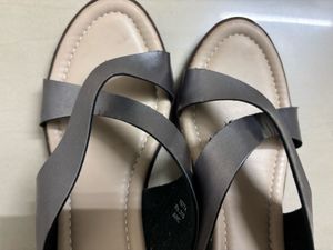 Stylish Silver Slip-On Sandals – Size 6