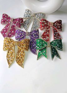 Purple Rhinestone Bow Clip