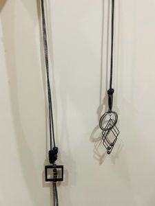 Transform any outfit with our geometric pendant