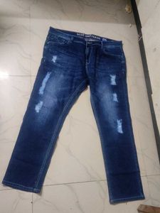 Distressed Blue Denim Jeans