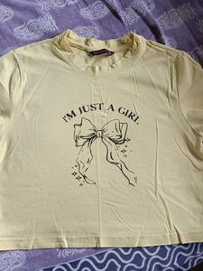 i'm just a girl yellow crop top