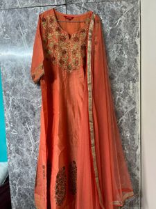 Elegant Orange Kurta Set with Embroidered Details