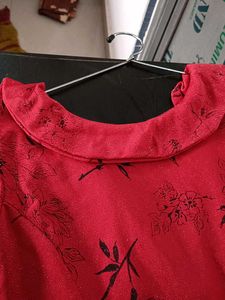 This is a  Red Dress With Unique Pattern Designs
