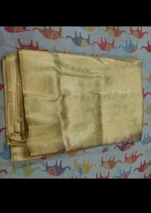 Golden Zari Knitting Work On Brown Base saree