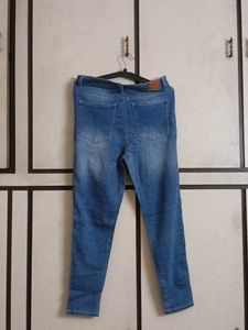 Distressed Denim Jeans