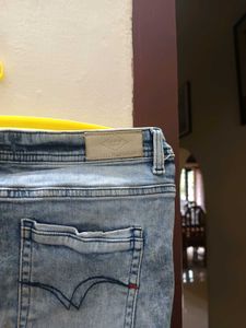 Lee Cooper slightly ripped jeans.