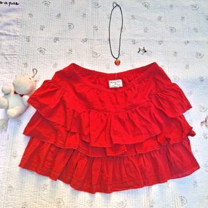 red ruffled short skirt