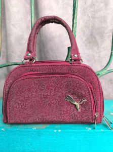 Set Of 4 Mini Handbags.