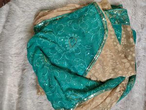 CREAM AND TURQUOISE GREEN SAREE