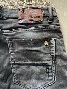 Ripped Grey Jeans
