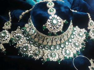 bridal jewellery set in green trending jeweller