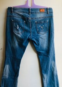 Flared Jeans With Patches
