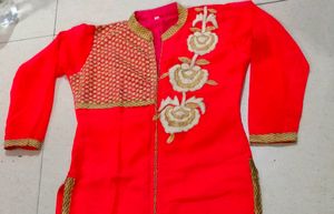 Pinkish Georgette Suit With Flower Design In Front