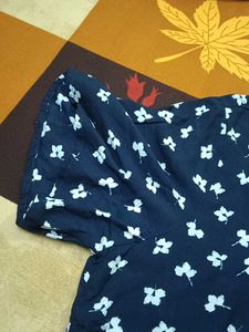 A Navy Blue Floral Top