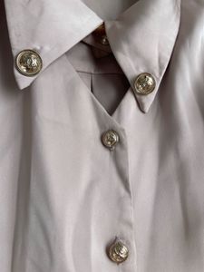 Elegant Blush Button-Down Top