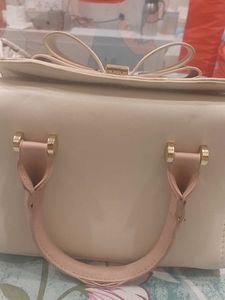 Check out this adorable pastel-colored handbag