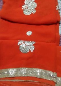 Orange Saree with Silver Embroidery