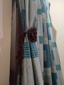 curtain holder brown colour