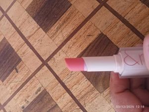 Rom&amp;nd Lipstick shade O6 Awesome, bright peach.