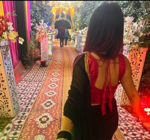 Selling Black Georgette Saree With Rani Pink Blous