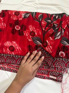 new red printed saree