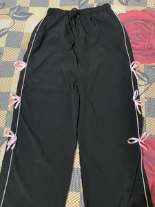 Trendy Black Track Pants with Pink Ribbon