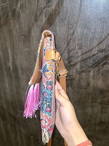 Vibrant Multicolored Sling Bag with Pink Tassels