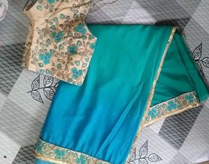 Saree With Deep Neck Blouse