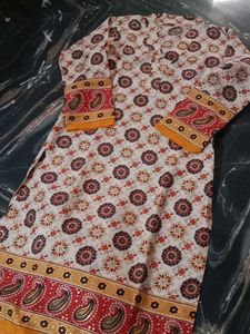 Mustard/Gold Pant And Off White Kurti.