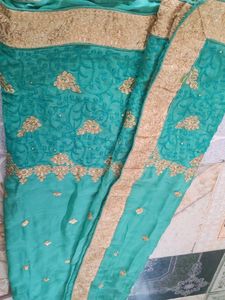 Elegant Teal Embroidered Saree