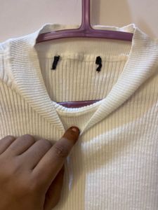 combo of white ribbed shirt and cotton shorts