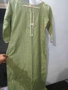 Pistachio Green Coloured Kurti With Thin Strips