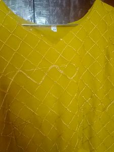 Beautiful Mustard Gown With Netted Layer