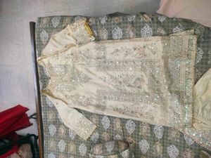 golden pakistani suit