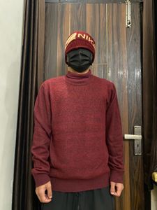 A Red Carter Balanche Sweater