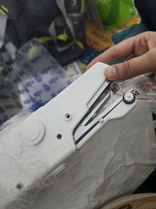 Han Held Sewing Machine