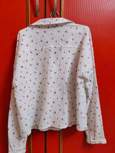 Crinkled White Shirt With Flower Detailing