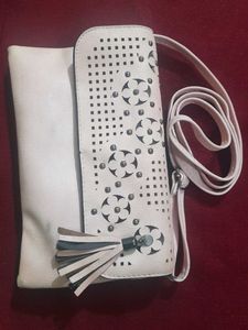 Chic Peach Clutch with Floral Detail