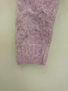 girls woolen sweater of white colour