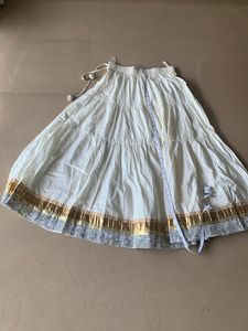 Fix price cream and golden skirt