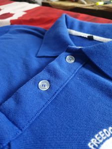 Sky blue 💙 Poli T-shirt ( next To new )