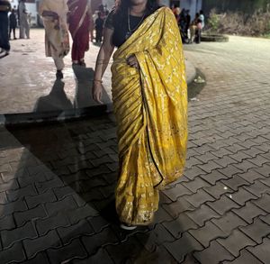 its good yellow color saree