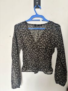 Sheer Peplum Top