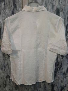 White Colored Shirt With Net Work On Front Sleeves