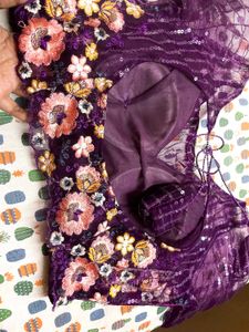 Celebrity Purple Netted Saree With Designer Blouse