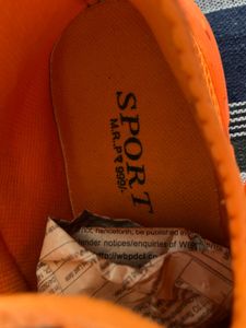 Orange sports shoes for mens